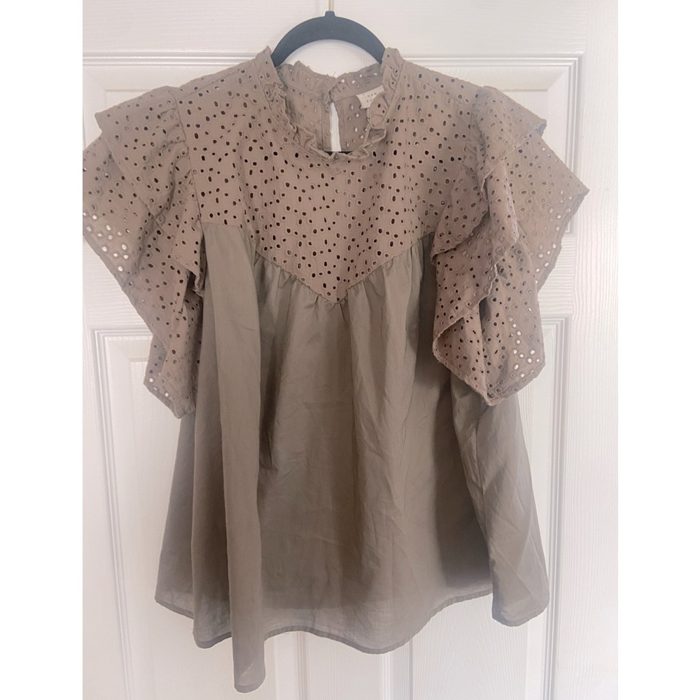 Brown blouse with cut out details. Size xxl
